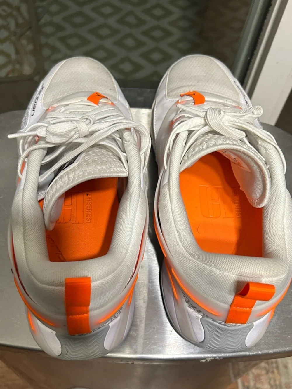 Sz 13 men Jordan Heirs White, Grey, and Laser Orange/Black accents.